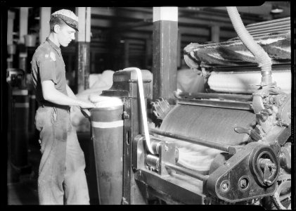 Millville, New Jersey - Textiles. Millville Manufacturing Co. (Man tipping canister.) - NARA - 518683
