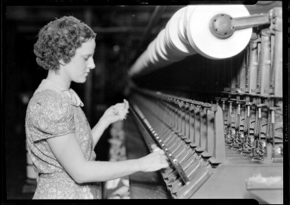Millville, New Jersey - Textiles. Millville Manufacturing Co. (Woman pulling thread.) - NARA - 518677