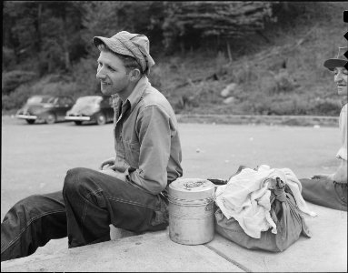 Miner waiting to catch the bus after finishing the day's work. Jewell Ridge Coal Company, Jewell Valley Mine... - NARA - 540705