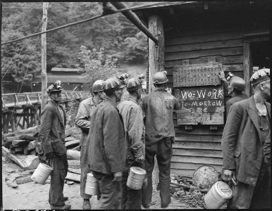 Miners bring in their checks and see the sign that there is no Saturday work. P V & K Coal Company, Clover Gap Mine... - NARA - 541295 photo