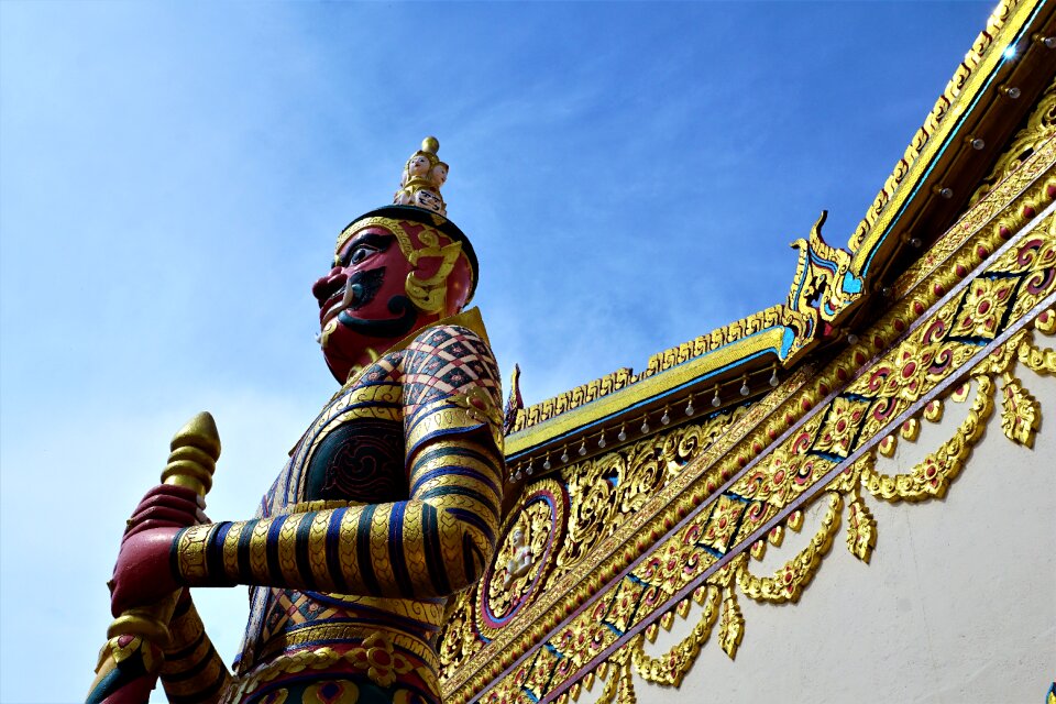Golden travel sculpture