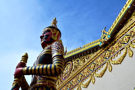 Golden travel sculpture