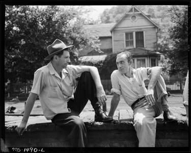Miners visit near the company store. Gilliam Coal and Coke Company, Gilliam Mine, Gilliam, McDowell County, West... - NARA - 540816