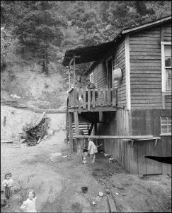 Miner and his family at home. Raven Red Ash Coal Company, No. 2 Mine, Raven, Tazewell County, Virginia. - NARA - 541064