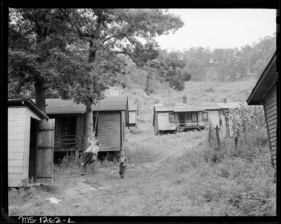 Miner's children playing. This camp has no supervised children's activities. Adults say children are bad, children... - NARA - 540761