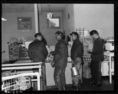 Miners at checking counter of company store. Pittsburgh Coal Company, Westland Mine, Westland, Washington County... - NARA - 540257