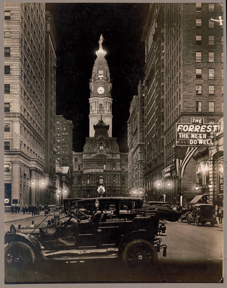 Night view of Broad Street with lit tower of City Hall, Philadelphia, Pennsylvania LCCN90705756