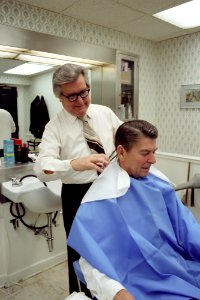Milton Pitts giving President Ronald Reagan a haircut in the West Wing Barber Shop