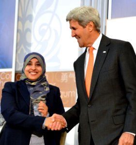 Nihal Naj Ali Al-Awlaqi of Yemen and U.S. Secretary of State John Kerry - IWOC 2016 photo
