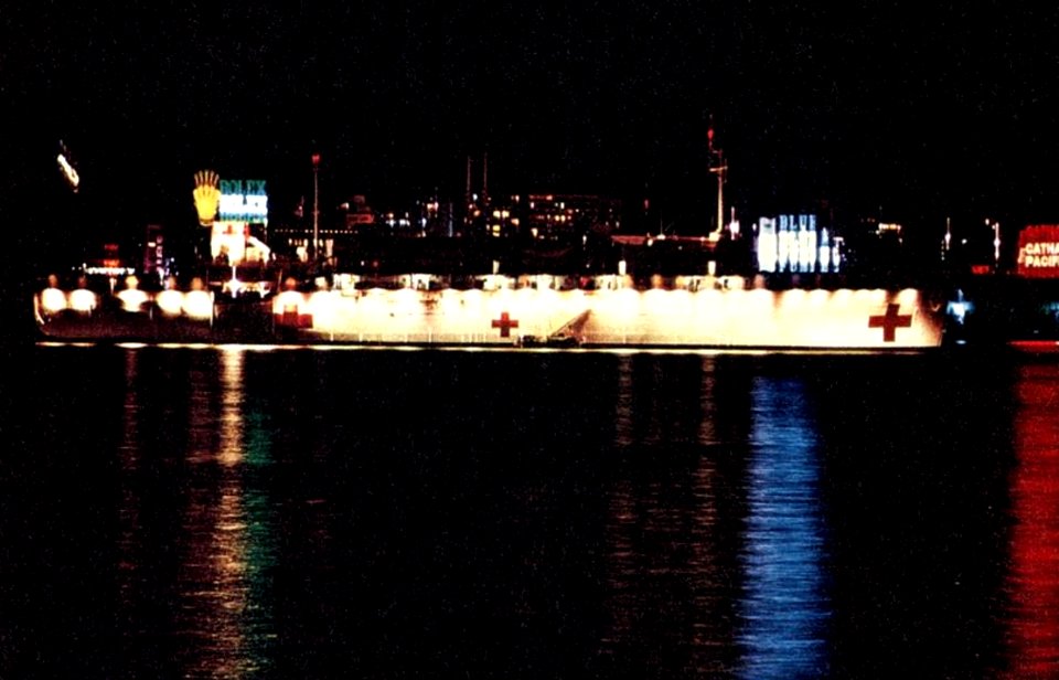 Night view of USS Sanctuary (AH-17) at Hong Kong, China, in July 1967