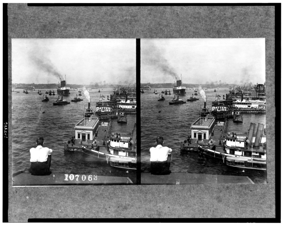 North from roof of pier -52 showing the S.S. Lusitania being warped into dock, New York City LCCN93504685