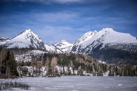 Snow blue sky lake photo