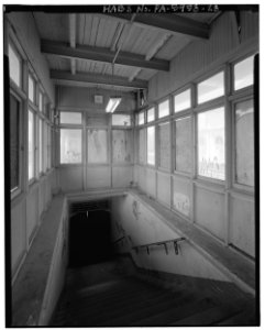 North-East view; Interior view of stair enclosure and stair from platform to main passenger terminal - North Philadelphia Station