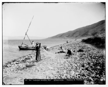 Northern views. Fishermen mending their nets LOC matpc.07018