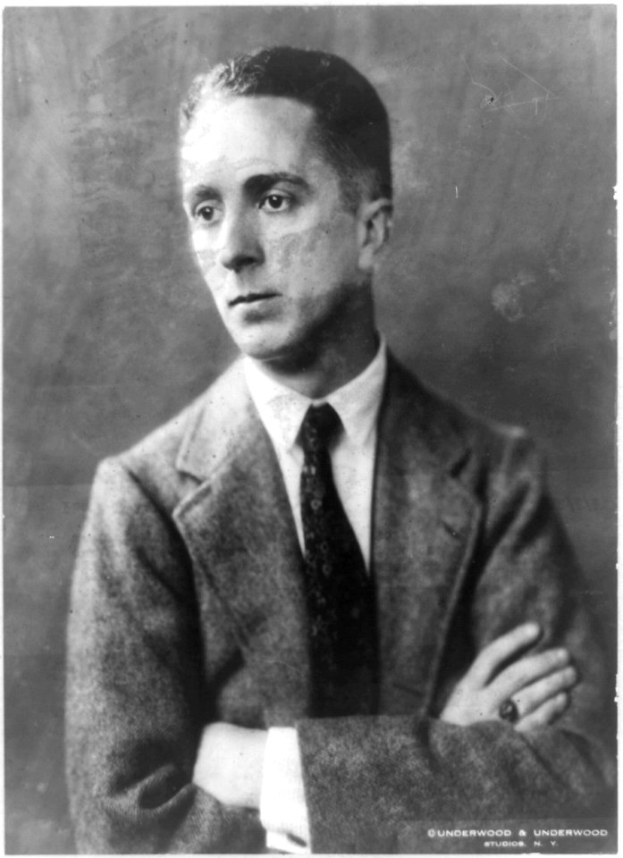 Norman Rockwell, half-length portrait, facing left, arms folded LCCN93510680