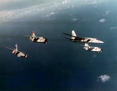 North American RA-5C Vigilante of RVAH-5 in flight over the Indian Ocean with LTV A-7E Corsair IIs of VA-147 and a Douglas EA-3B Skywarrior of VQ-1, in November 1974 (NNAM.1996.488.210.175)