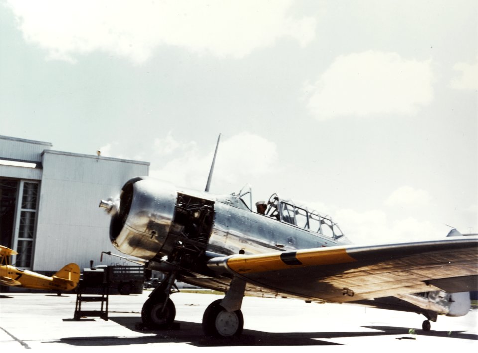 North American SNJ Texan running its engine at a Naval Air Station during World War II (80-G-K-13381)