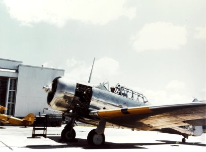 North American SNJ Texan running its engine at a Naval Air Station during World War II (80-G-K-13381)