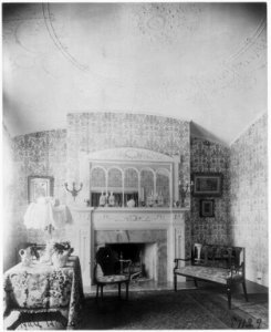 Ornate interiors of Chandler Hale house, 1001 16th St., N.W., Washington, D.C., showing piano, fireplaces, and china closet LCCN2002697453