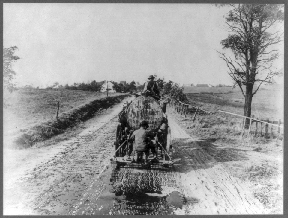 Oil distributer at work (spreading oil on dirt road) LCCN2016650675