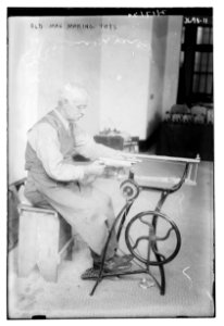 Old man making toys LCCN2014700529