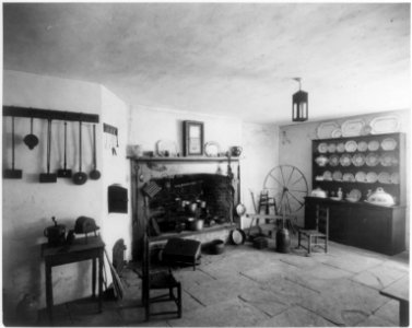 Old kitchen in Telfair Academy, Savannah, Ga. fireplace, china hutch, and spinning wheel. LCCN2012647911