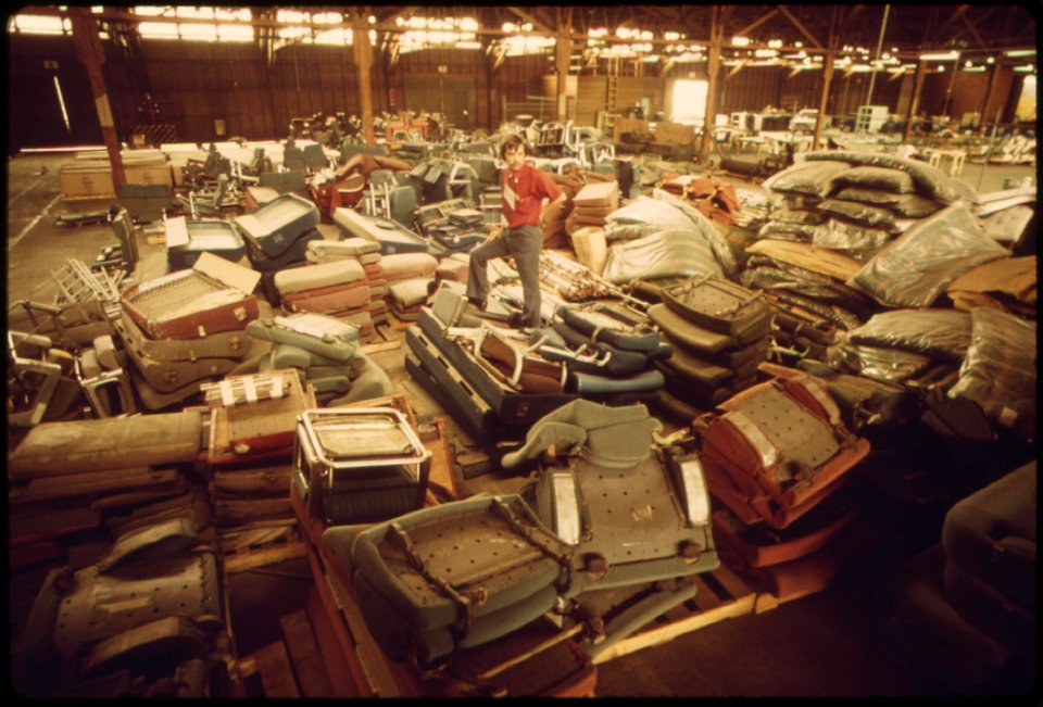 Old-equipment-from-amtrak-passenger-cars-is-piled-in-a-warehouse-may-1974 7158079168 o