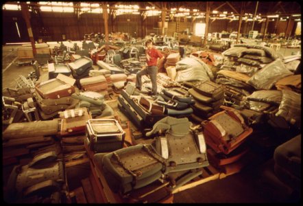 Old-equipment-from-amtrak-passenger-cars-is-piled-in-a-warehouse-may-1974 7158079168 o photo