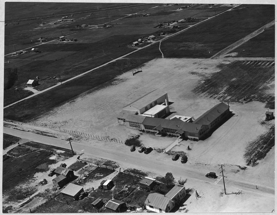 Olivehurst, Yuba County, California. Air view of Olivehurst school enlarged to accommodate migrant c . . . - NARA - 521592