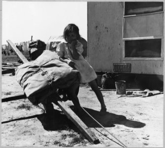 Olivehurst, Yuba County, California. Child of parents who were migratory workers, now settling in Ol . . . - NARA - 521604