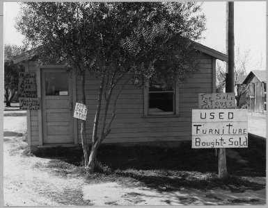 Olivehurst, Yuba County, California. Second-hand business operations in rapidly growing shacktown co . . . - NARA - 521595 photo