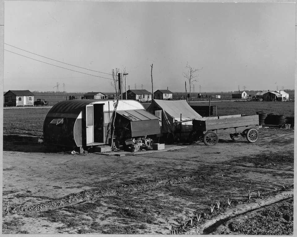 Olivehurst, Yuba County, California. The beginnings of a new home. The house-trailer has been raised . . . - NARA - 521602