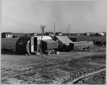 Olivehurst, Yuba County, California. The beginnings of a new home. The house-trailer has been raised . . . - NARA - 521602 photo