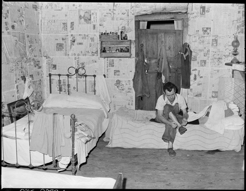 Oliver Hinkle, disabled miner, in the bedroom of his home. Kentucky Straight Creek Coal Company, Belva Mine.... - NARA - 541229
