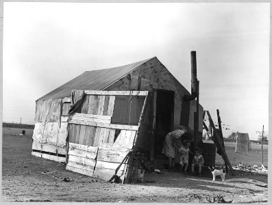 Oliverhurst, Yuba County, California. Another of the 26 homes on Second Avenue. Family with three ch . . . - NARA - 521581 photo