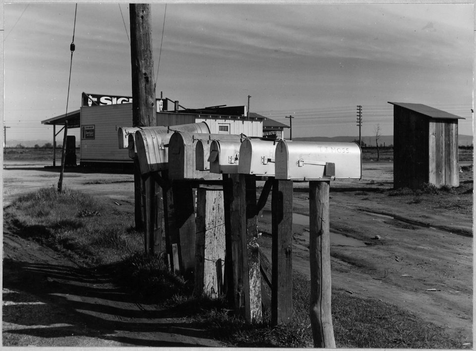 Oliverhurst, Yuba County, California. Mailboxes at head of Second Avenue and Olivehurst Street. A ma . . . - NARA - 521576