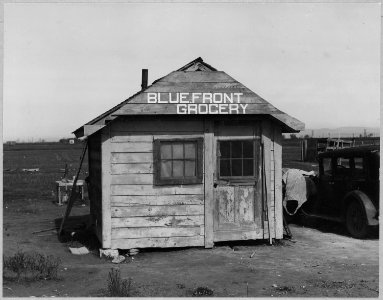 Oliverhurst, Yuba County, California. Store on Second Avenue represents the beginning of a commercia . . . - NARA - 521583 photo