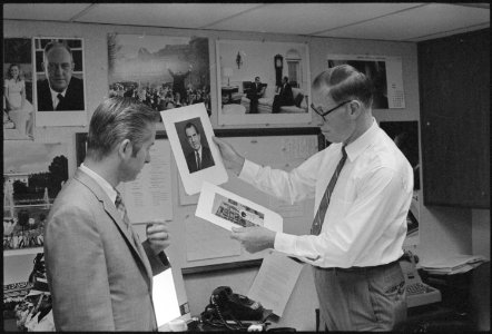 Ollie Atkins in the White House photo office - NARA - 194647