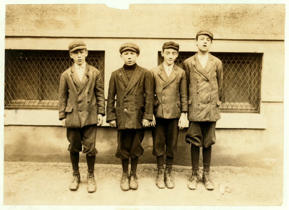 On left end of picture is Thomas Kelley, 275 Lakeview Avenue, has been doffing in lower spinning room No. 2 for one month. Appears 12 or 13 years. Next to Thomas are Patrick and Walter. (See LOC cph.3b43672