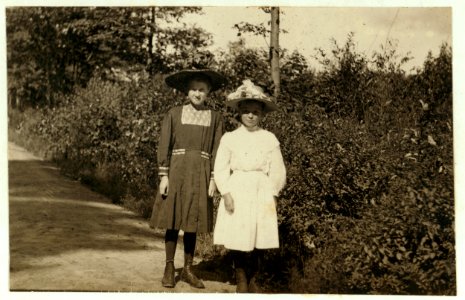 On left is Anna Pagnette; said 12 yrs. old, has been helping sister in Glenallen Mill all summer. On right is Alice Dugas; said 11 years old and helps sister Annie spin Glenallen Mill. Annie LOC nclc.02317