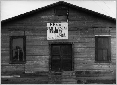 Olivehurst, Yuba County, California. Another view of church on Second Avenue. Preacher was a migrant . . . - NARA - 521579 photo
