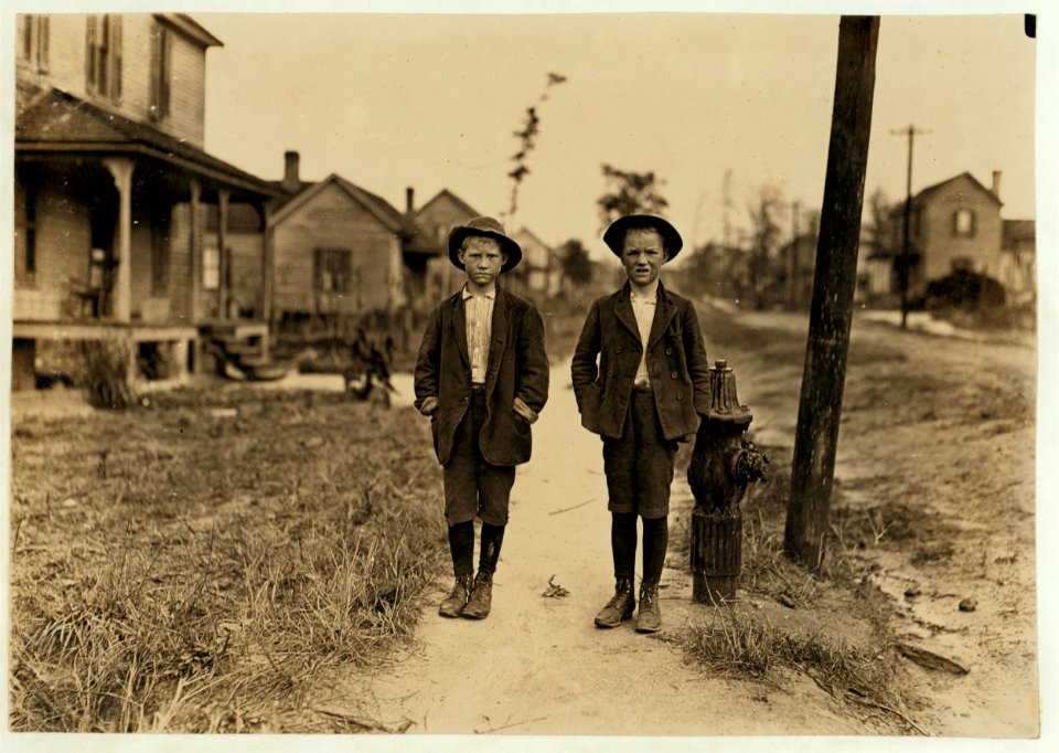 On streets near Daniel Mill. Lincolnton, N.C. Right hand boy-Dan Biggerstaff. 10 years old. Has worked 3 years. Goes to school now (he says). Left hand, John Erwin. Said 11 years old. Has LOC nclc.01384