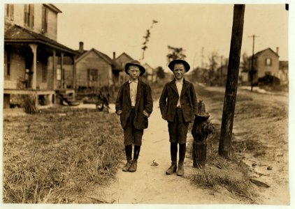 On streets near Daniel Mill. Lincolnton, N.C. Right hand boy-Dan Biggerstaff. 10 years old. Has worked 3 years. Goes to school now (he says). Left hand, John Erwin. Said 11 years old. Has LOC nclc.01384