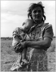 On Arizona Highway 87, south of Chandler, Arizona. Grandmother and sick baby of migratory family ca . . . - NARA - 522263