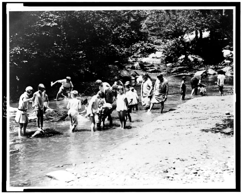 On one of the hottest days recorded in the National Capital both women and children rush to the water for relief. Snapped in Rock Creek Park LCCN92513243