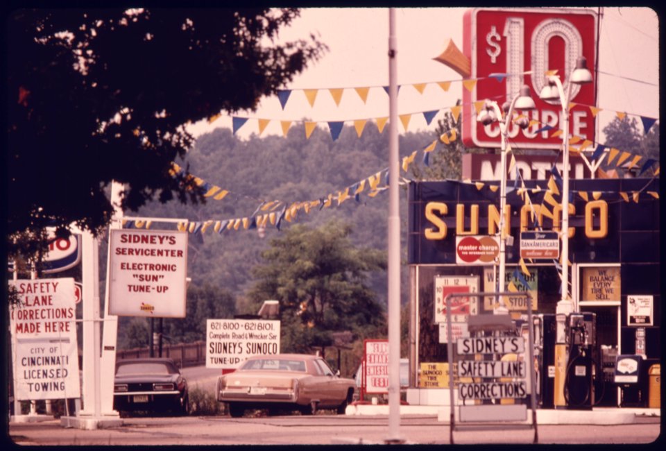 One of Several Service Station That Advertise Tuneups to Pass Emissions and Safety Tests Is Located near an Auto Emission Inspection Station in Downtown Cincinnati, Ohio...08-1975 (4265800085)