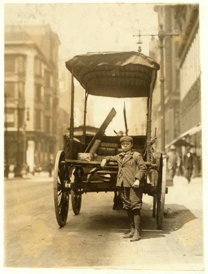 One of the many young boys working as assistants on express wagons. May 13, 1910. 11 A.M. Adams Express Co. LOC nclc.03513