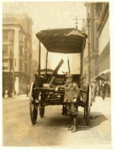 One of the many young boys working as assistants on express wagons. May 13, 1910. 11 A.M. Adams Express Co. LOC nclc.03513