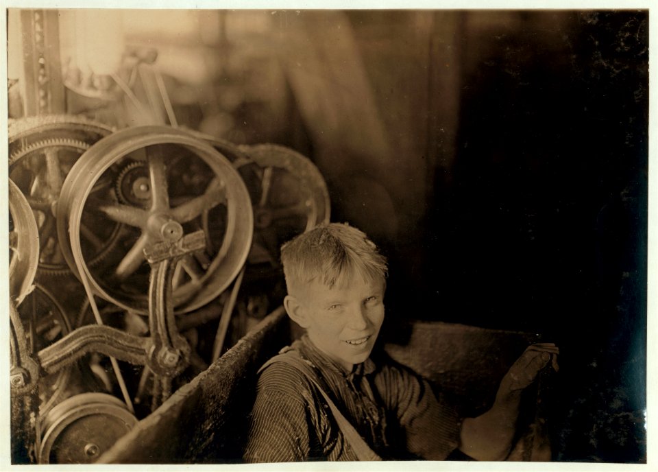 One of the young spinners in the Quidwick Co. Mill. Anthony, R. I. (A Polish boy Willie) who was taking his noon rest in a doffer-box. (...) LOC cph.3b47548