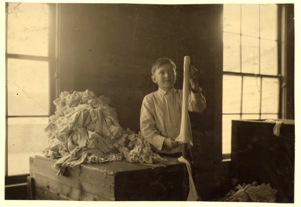 One of the youngest turners at work in the Crescent Hosiery Mill. LOC nclc.02945
